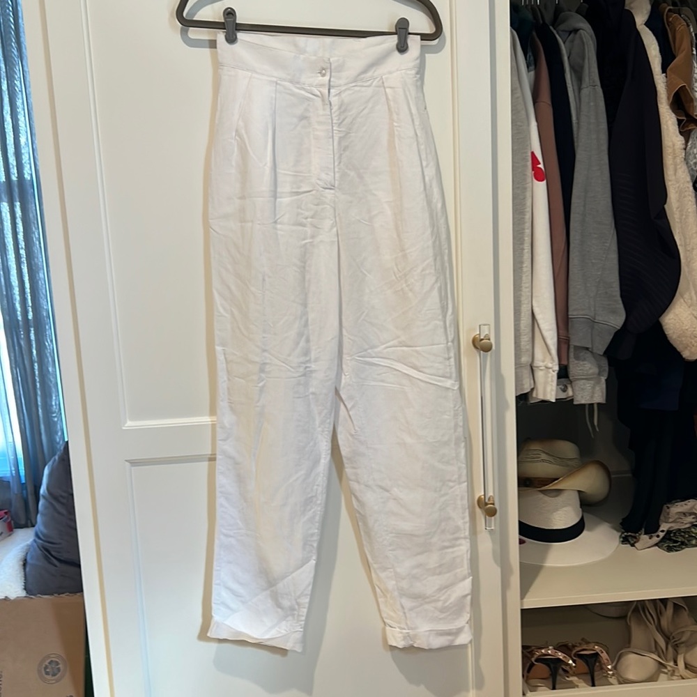 White pleated linen trousers